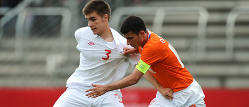 The two goalscorers battle for possession.